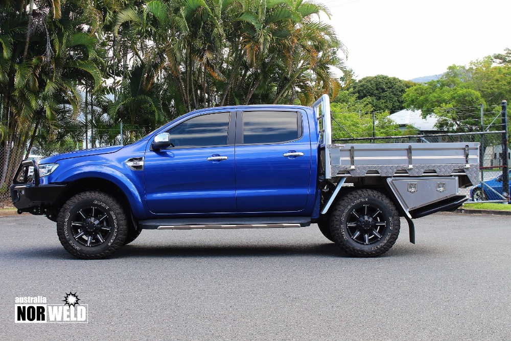 Blue trayback 4-door ute