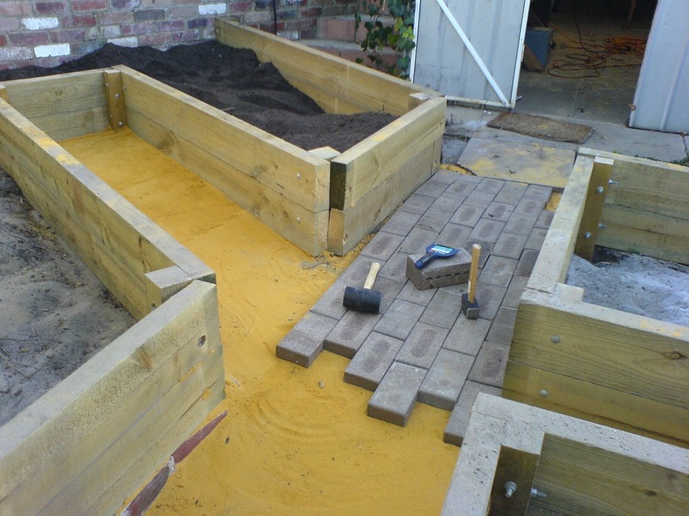 Paving between the garden beds